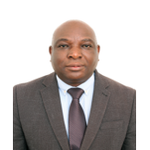 This is a professional portrait of a university lecturer and researcher specialising in Demography and Monitoring and Evaluation